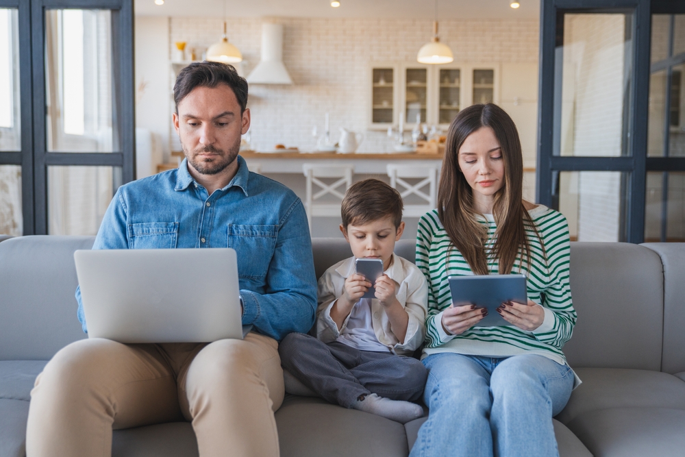 The library open on a laptop, a tablet and a phone